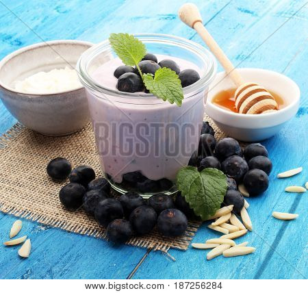 Beautiful Appetizer Pink Raspberries Fruit Smoothie Or Milk Shake In Glass Jar With Berries Backgrou