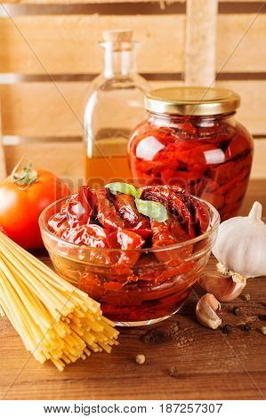 Italian Spaghetti With Ingredients For Cooking Pasta On A Wooden Table