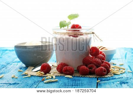 Beautiful Appetizer Pink Raspberries Fruit Smoothie Or Milk Shake In Glass Jar With Berries Backgrou