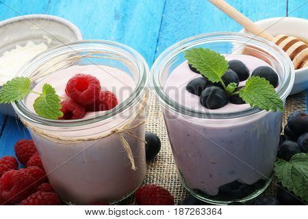 Beautiful Appetizer Pink Raspberries Fruit Smoothie Or Milk Shake In Glass Jar With Berries Backgrou