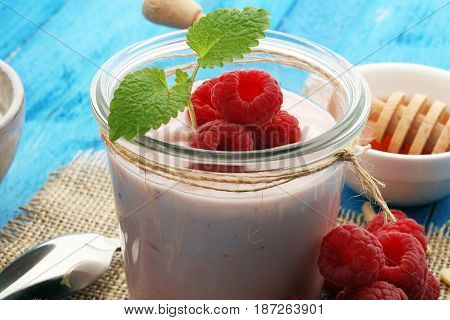 Beautiful Appetizer Pink Raspberries Fruit Smoothie Or Milk Shake In Glass Jar With Berries Backgrou