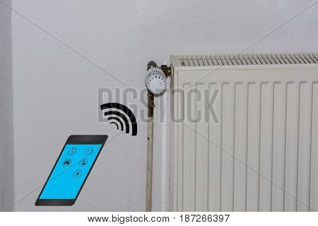 Smart Home Control concept. Temperature adjustment of heating via smartphone.