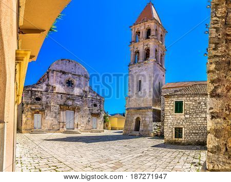 Old architecture in city center of town Starigrad, Island Hvar square view, european summertime travel places.