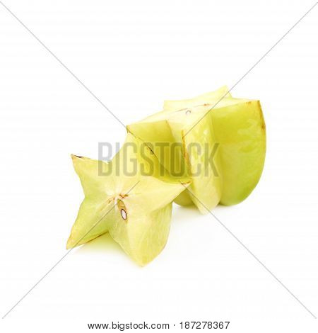Sliced carambola starfruit fruit isolated over the white background