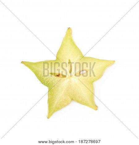 Single cross-section slice of carambola starfruit fruit isolated over the white background