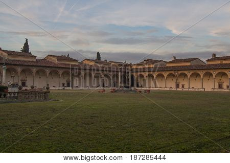 Italy Florence - December 24 2016: the view of the large cloister and inner courtyard of Florence Charterhouse church Certosa di Galluzzo di Firenze on December 24 2016 in Florence Tuscany Italy.