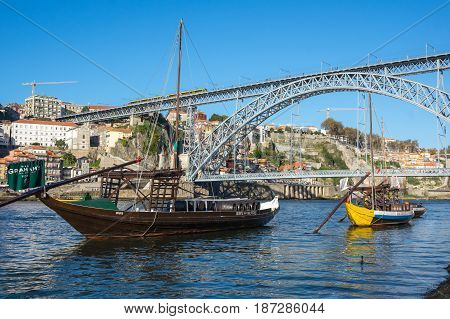 PORTO PORTUGAL - OCTOBER 20 2015: The Dom Luis I Bridge is a double-decked metal arch bridge that spans the Douro River between the cities of Porto and Vila Nova de Gaia in Portugal