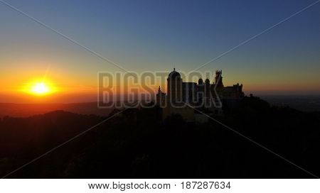 Sunset over Pena Palace castle in SÃ£o Pedro de Penaferrim, in the municipality of Sintra, Portugal.