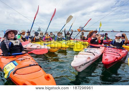 Labuan,Malaysia-Feb 19,2017:Group of adventurer enjoying a weekend kayaking in Labuan island,Malaysia.Malaysia is the ideal place for water sports,like white water rafting,kayaking & scuba diving