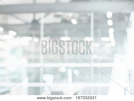 Abstract blur modern business office white and gray bokeh lights background with motion blur for your design