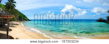 Panoramic of golden sand beach and turquoise waters of Tioman Island Malaysia
