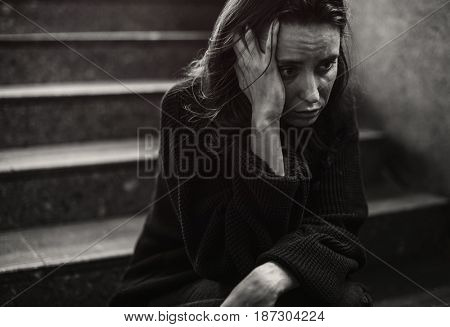Adult Woman Sitting Look Worried on The Stairway