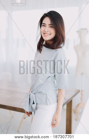 Portrait Of Beautiful Asian Girl With Beautiful Clothing And Relex Posting.