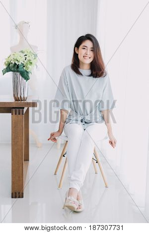Portrait Of Beautiful Asian Girl With Beautiful Clothing And Relex Posting.