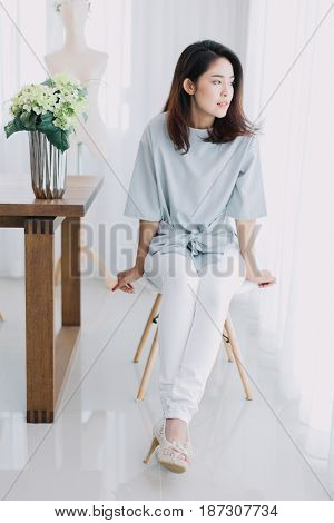 Portrait Of Beautiful Asian Girl With Beautiful Clothing And Relex Posting.