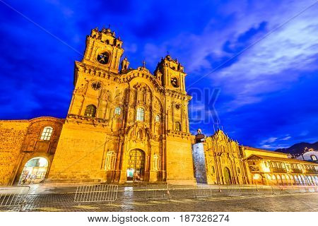 Cusco Peru - Plaza de Armas and Church of the Society of Jesus. Andes Mountains South America.