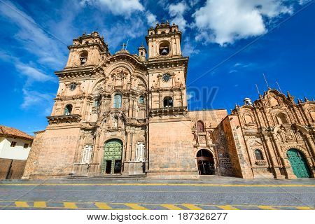 Cusco Peru - Plaza de Armas and Church of the Society of Jesus (spanish: Iglesia de la Compania de Jesus)