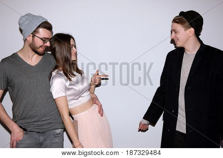 Woman choose one of two men. Love game. Competition of boyfriends, polygamy, friendship, party, first date concept