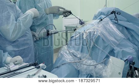 Laparoscopic surgery of the abdomen. The team of medical specialists conducting laparoscopic surgery.