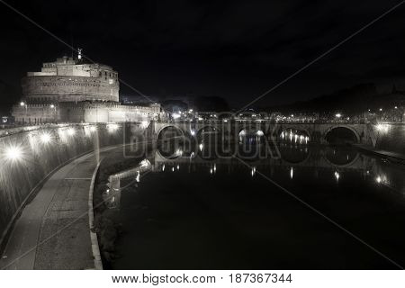 Ponte and Castle Sant Angelo, bridge in Rome. Italy. Tiber river. Black and white. Once Aelian Bridge or Pons Aelius, meaning the Bridge of Hadrian, is a Roman bridge.