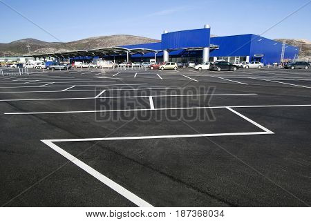 Parking lot in the shopping mall, White stripes on the blacktop