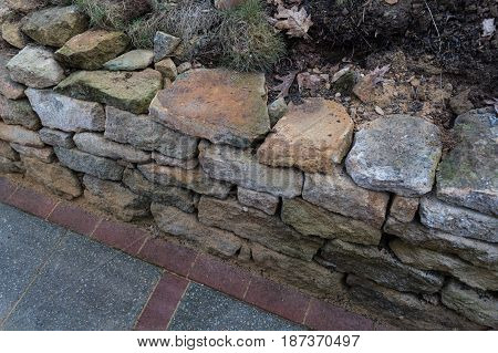 Natural stone wall dry laid with sandstone from the city of Rheine.