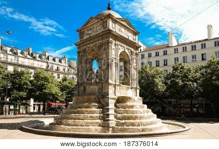 The Fontaine des Innocents is a monumental public fountain located on the place Joachim-du-Bellay in the Les Halles district in the 1st arrondissement of Paris, France.