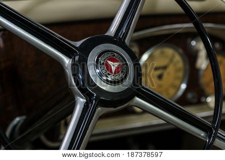 STUTTGART GERMANY - MARCH 04 2017: Fragment of the steering wheel of the mid-size car Mercedes-Benz 170 (W136). Close-up. Europe's greatest classic car exhibition 