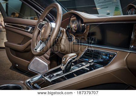 STUTTGART GERMANY - MARCH 04 2017: Interior of the full-size luxury car Porsche Panamera Turbo 2016. Europe's greatest classic car exhibition 