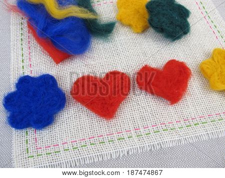 Felted figures from coloring dryer felting wool