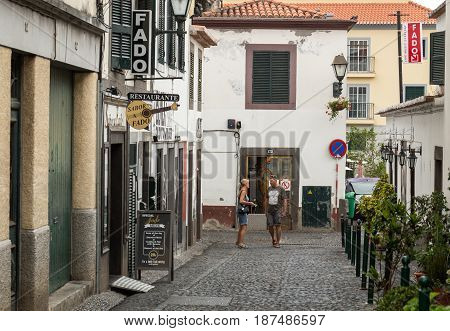 FUNCHALMADEIRA PORTUGAL SEPTEMBER 8 2016: Zone Velha - the oldest district famous for its best restaurants and cafes in Funchal. Madeira Portugal