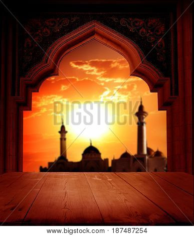 Islamic greeting Eid Mubarak cards for Muslim Holidays.Eid-Ul-Adha festival celebration.Ramadan Kareem background with  mosque window and table