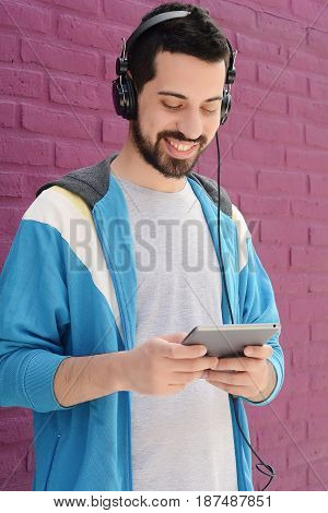 Man Using A Tablet.