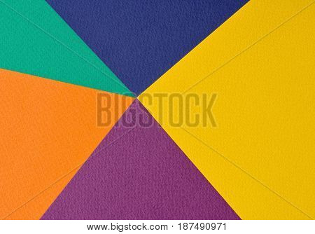 Colorful background - sheets of embossed color paper.