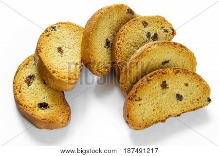 Slised bread with raisins isolated on white background, top view