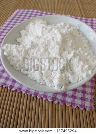 Lactose from milk, milk sugar in bowl