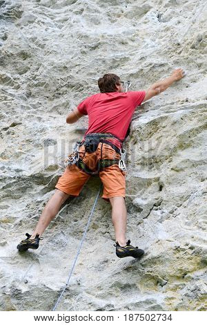 Person Climbing On The Rock At Engelberg