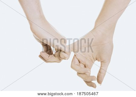 Female and male hands together.