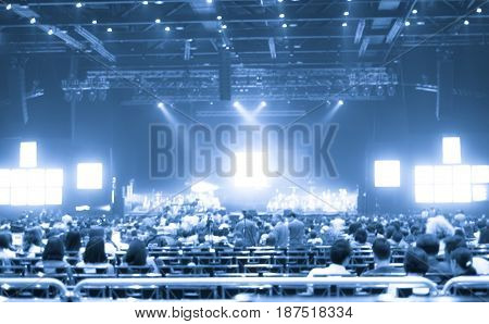 Blurred Background : Bokeh Lighting In Concert With Audience ,music Showbiz Concept