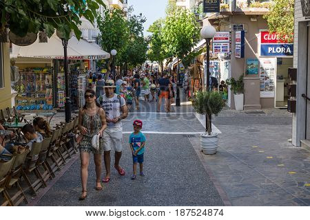 CRETE GREECE - JULY 11 2016: The narrow shopping streets of a coastal elite tourist town Agios Nikolaos on the Greek island of Crete.