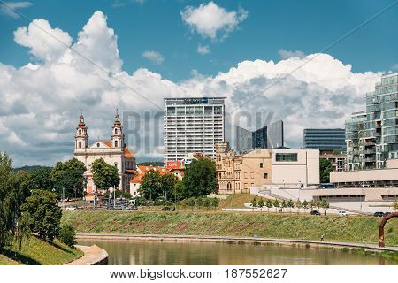 Vilnius, Lithuania  - July 5, 2016:  Church Of The St Raphael The Archangel And Former Jesuit Monastery, Radisson Blu Hotel In Sunny Summer Day.
