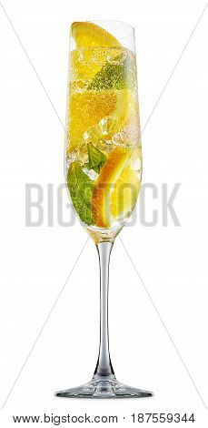 fresh fruit alcohol cocktail or mocktail in champagne glass with ice cubes, orange and mint isolated on white background