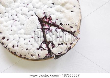 Tender homemade baking blueberry pie with lilac and tea