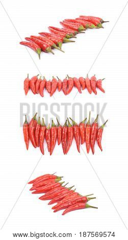 Lined up pile of red italian peppers isolated over the white background, set of four different foreshortenings