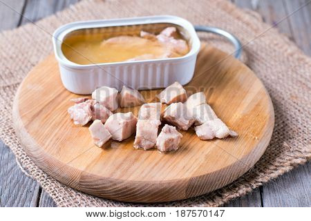 Liver of cod on a wooden board