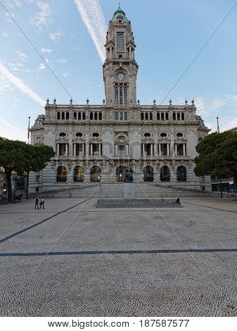PORTO, PORTUGAL - MAY 8, 2017: People in front of City Hall on Avenida dos Aliados. Built  at the beginning of the 20th century. it has the solid 70m high tower with a carillon clock