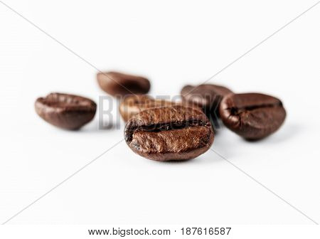close up on coffee beans white background