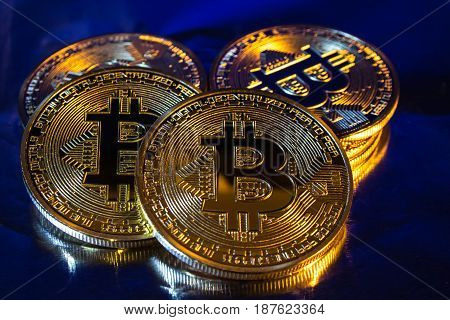 Cryptocurrency Physical Golden Bitcoin Coin On Colorful Background