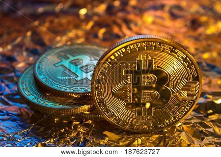 Cryptocurrency Physical Golden Bitcoin Coin On Colorful Background