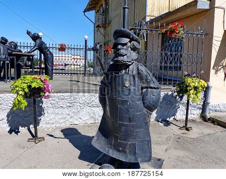 Berezovsky, Russia - May 19, 2017: Monument janitor in the center of Berezovsky. Closeup. Ural
